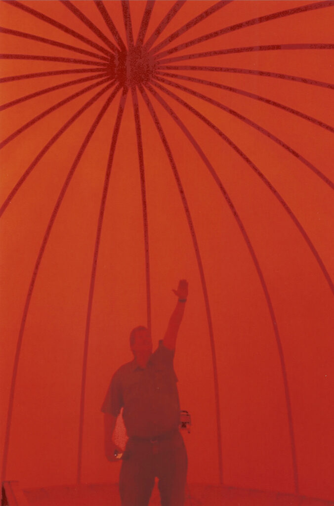 Ray Brooks standing inside an inflated airform.