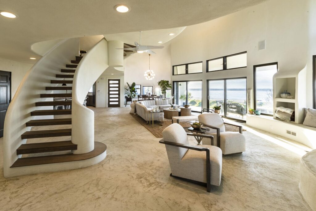 03-eye-of-the-storm-living-room-staircase.huge