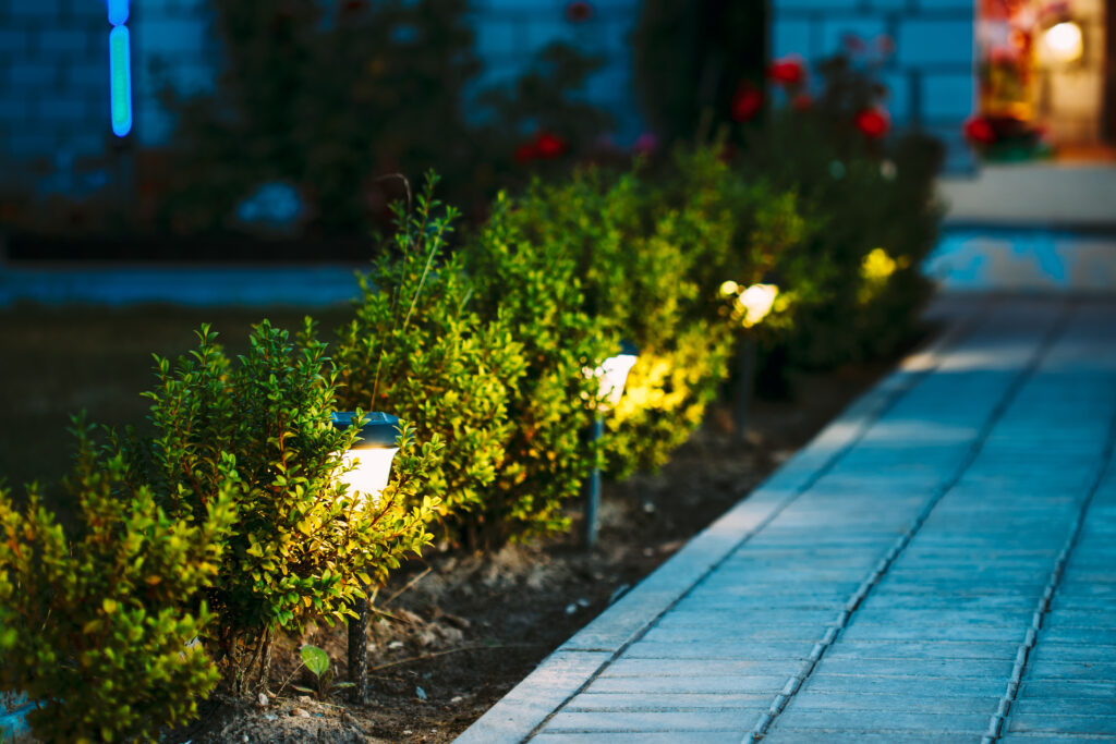 A lit concrete path